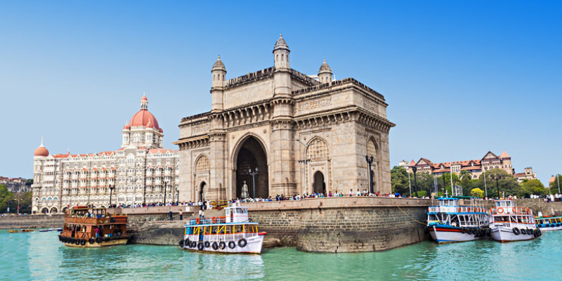 The Gateway of India and boats as seen from the Mumbai Harbour in Mumbai, India