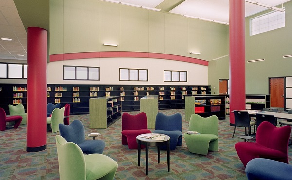 Interior Photography of The Library With Empty Seating In The Foreground In The Modern School.