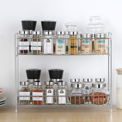An open kitchen rack with items arranged in it